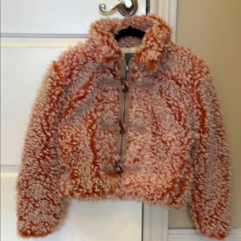 Faux fur pink coat by Anthropologie